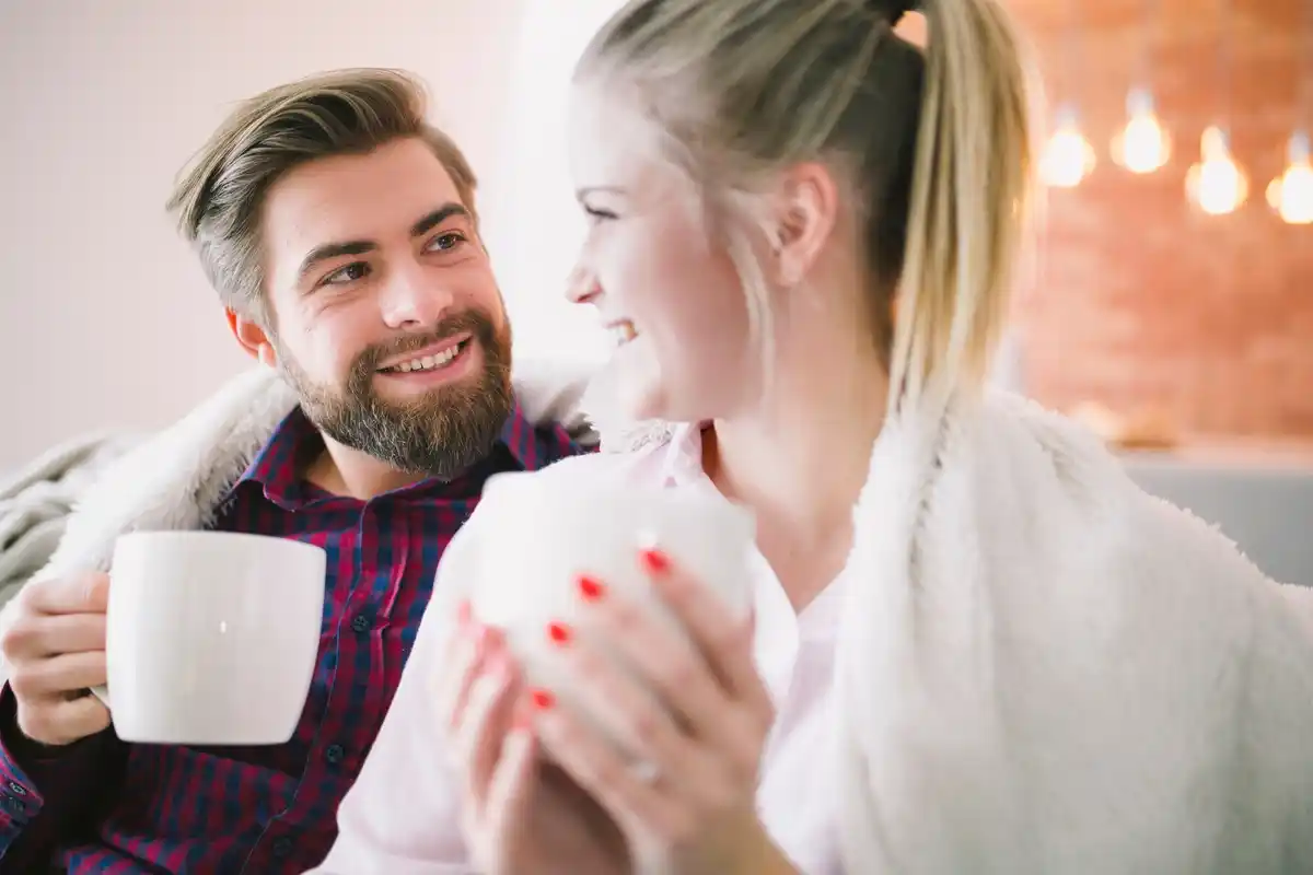 Couple laughing together at home, Dutch style