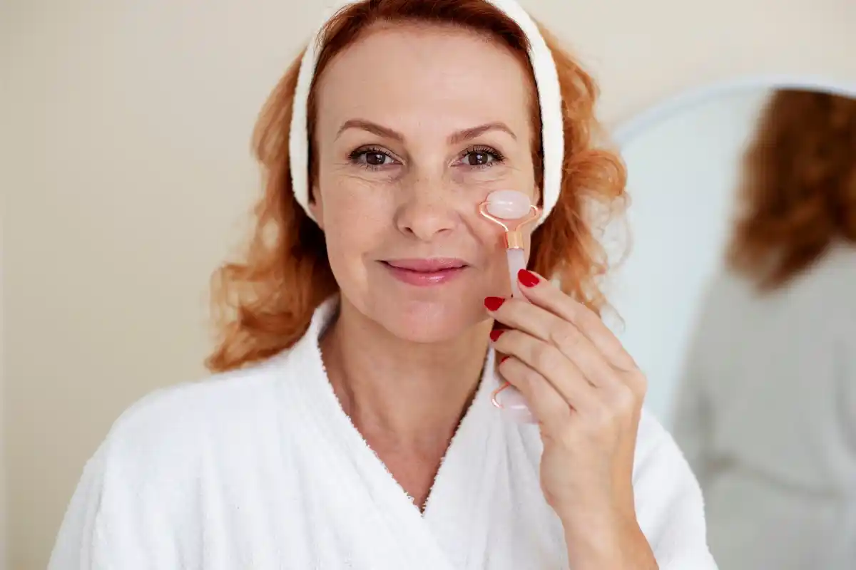 face cream wrong direction wrinkles woman dutch bathroom skincare closeup