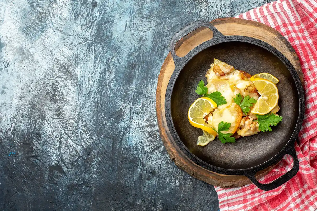 chicken cooking in pan with steam ice trick