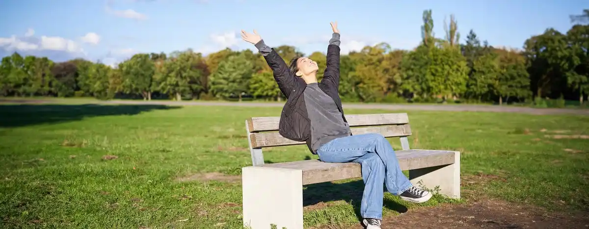 Dutch people relaxing in park, letting go, happy