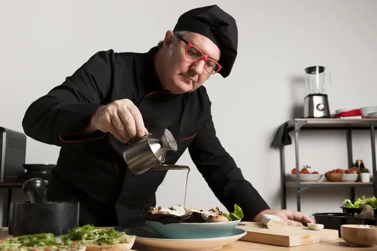 chef sprinkling salt into coffee
