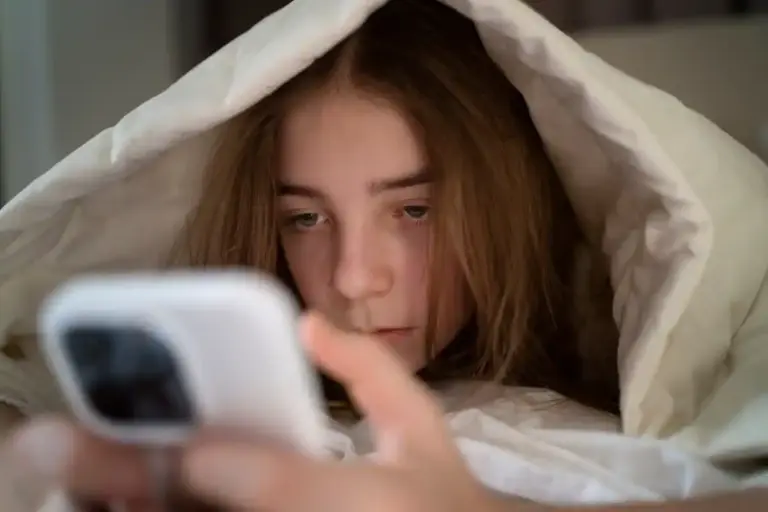 nighttime phone charging risk bed overheating