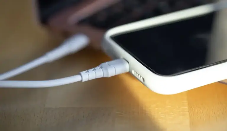 overheated phone charger plugged in dutch wall socket
