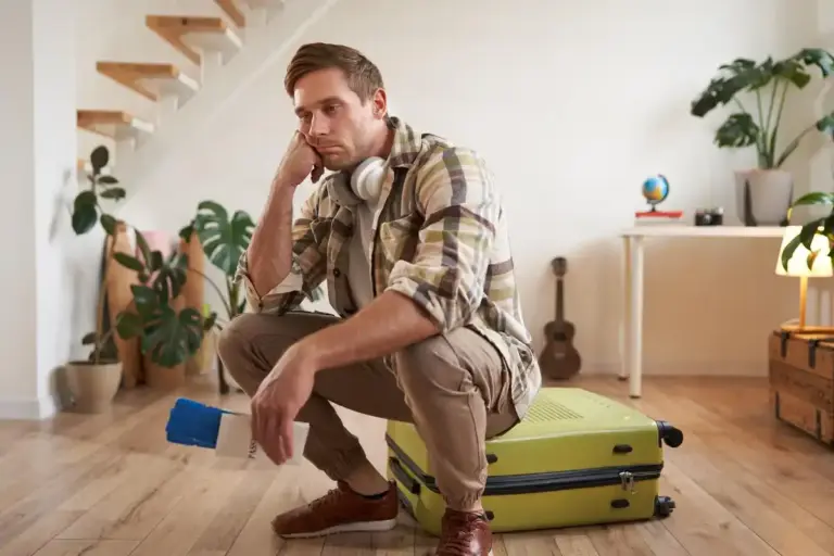 frustrated traveler searching for lost suitcase at airport, Netherlands