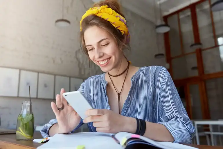 dutch adult distracted using popular learning app on phone