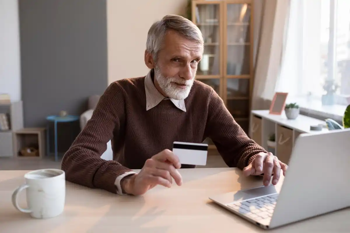 Dutch unhappy person looking at increased internet bill