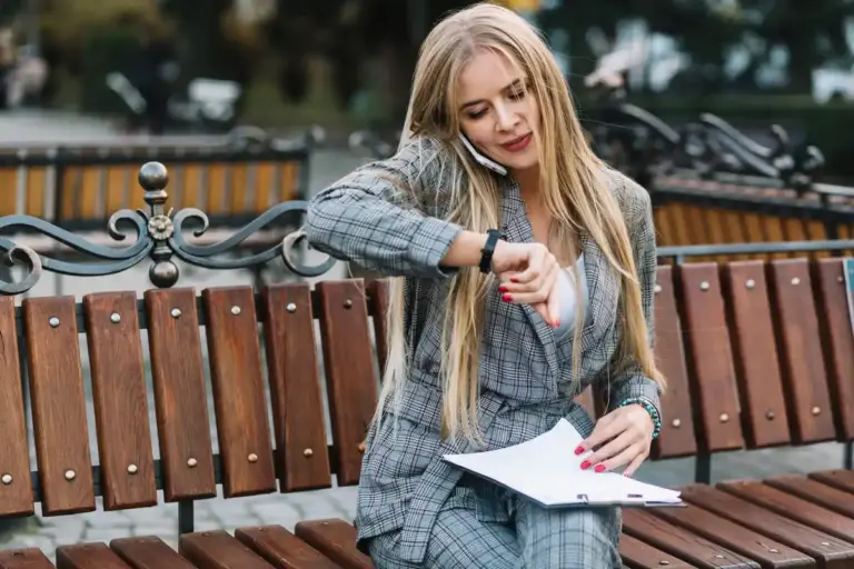 dutch woman looking at empty wallet street city