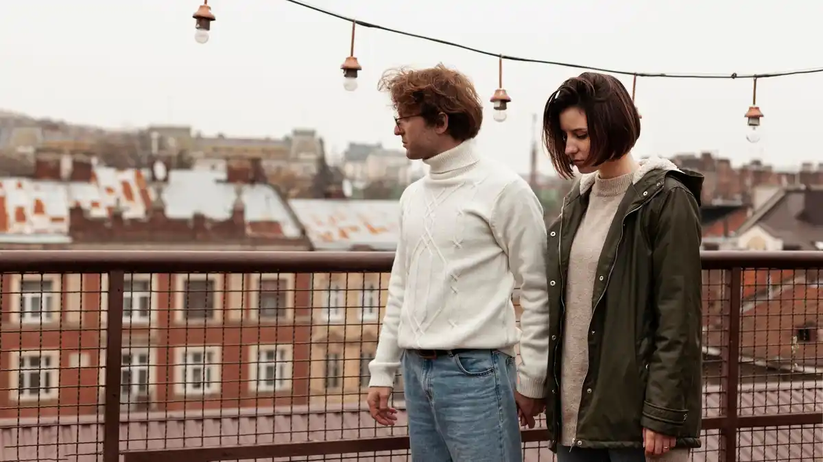 Dutch couple talking first date urban canal