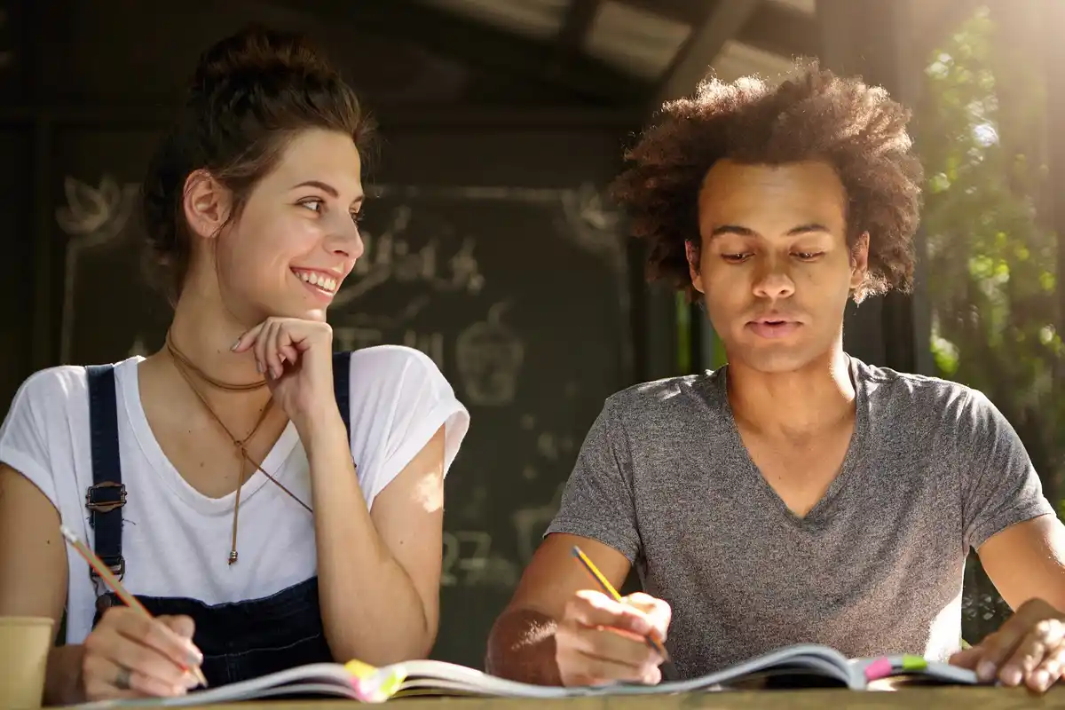 dutch students studying together at cafe friendly natural