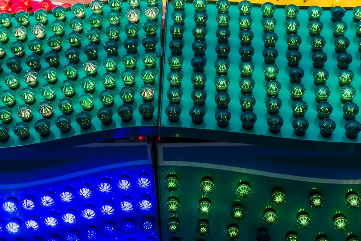 close-up of euro coins and payment terminal on dutch market