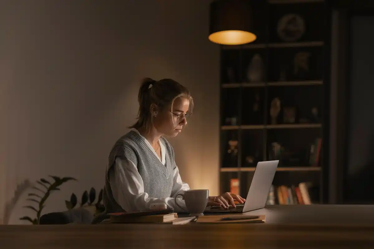 silent focused work desk adult sunlight