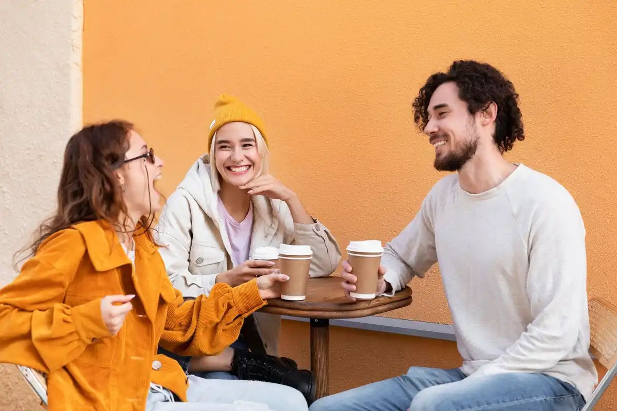 Friends having meaningful conversation at a Dutch café