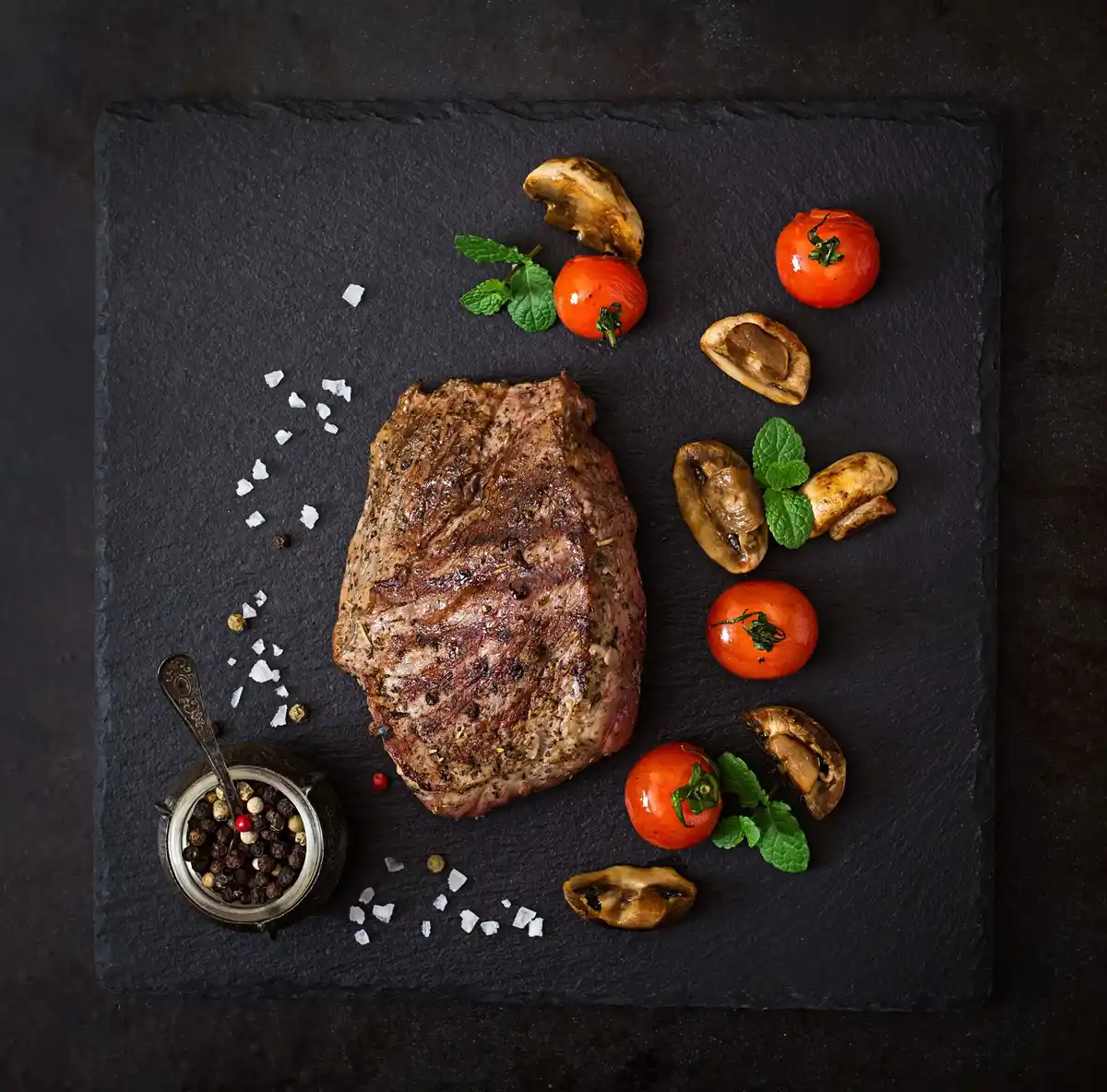 juicy steak close-up with melting ice cube