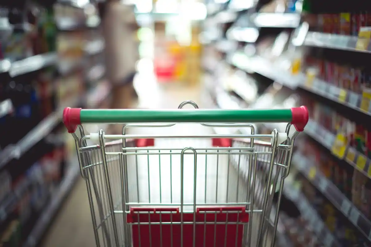 Dutch supermarket early morning with nearly empty aisles, realistic lighting