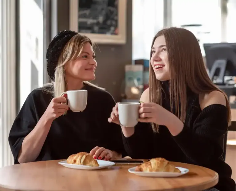 dutch friends having conversation in a cozy cafe