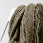 ruined sweater in washing machine close up