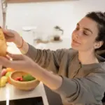Dutch person ignoring his microwave in a cozy home kitchen
