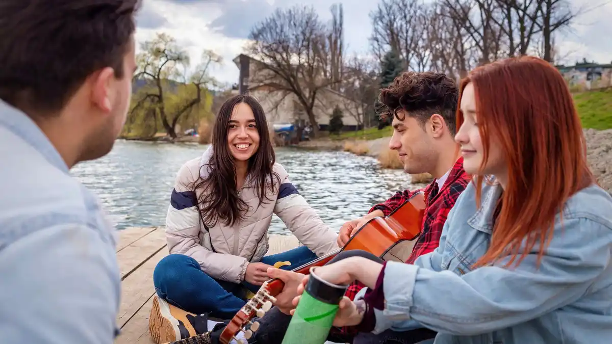 Dutch teenagers meeting up to talk outdoors