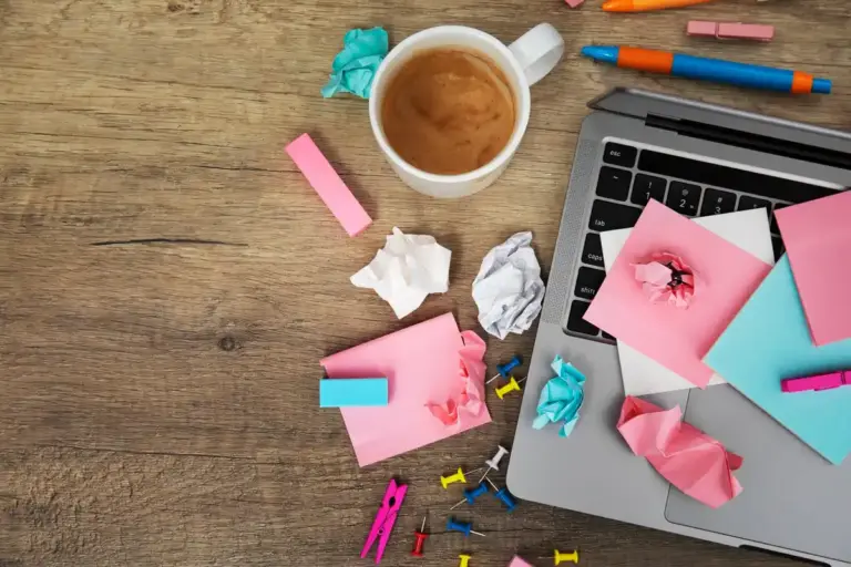 cluttered desk highlighting one distracting object
