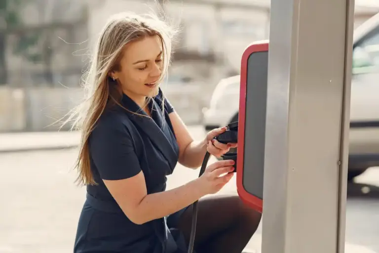 Dutch people using shared charging station in city