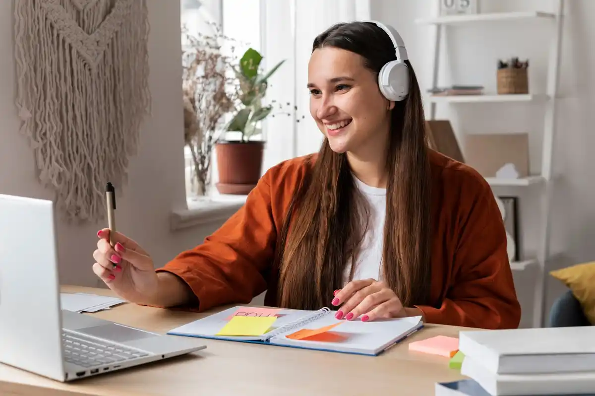 Dutch student using TikTok for studying, phone with textbooks, cozy desk