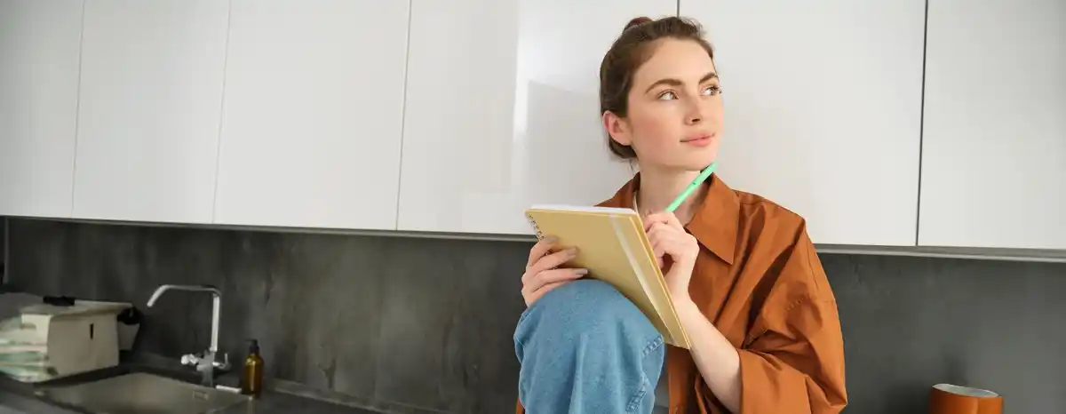student studying in front of a mirror at home