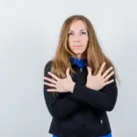 crossed arms body language negative communication