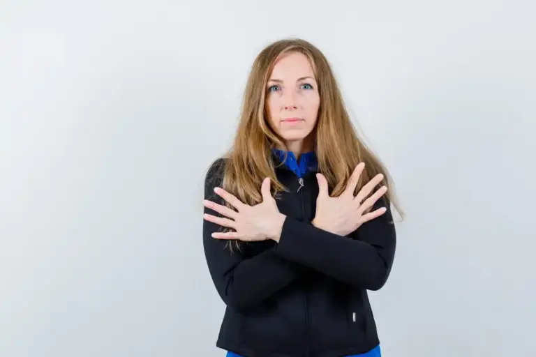 crossed arms body language negative communication