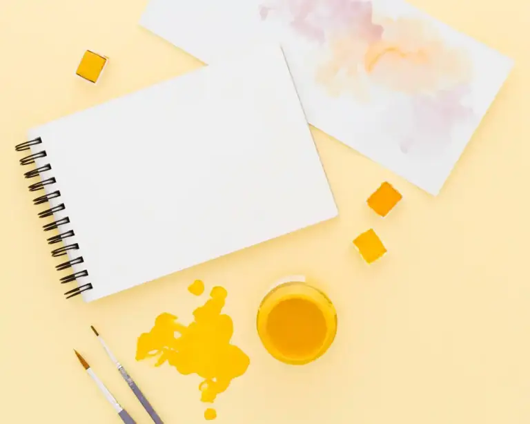 bright yellow notebook on minimalist Dutch office desk