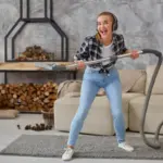 Dutch woman cleaning floor with steam cleaner