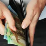 closeup old phone chargers cash money Netherlands