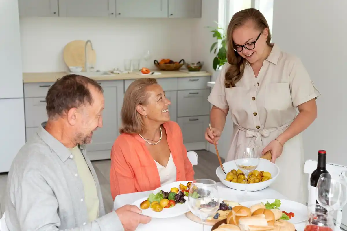 Dutch fifty plus preparing healthy international meal together
