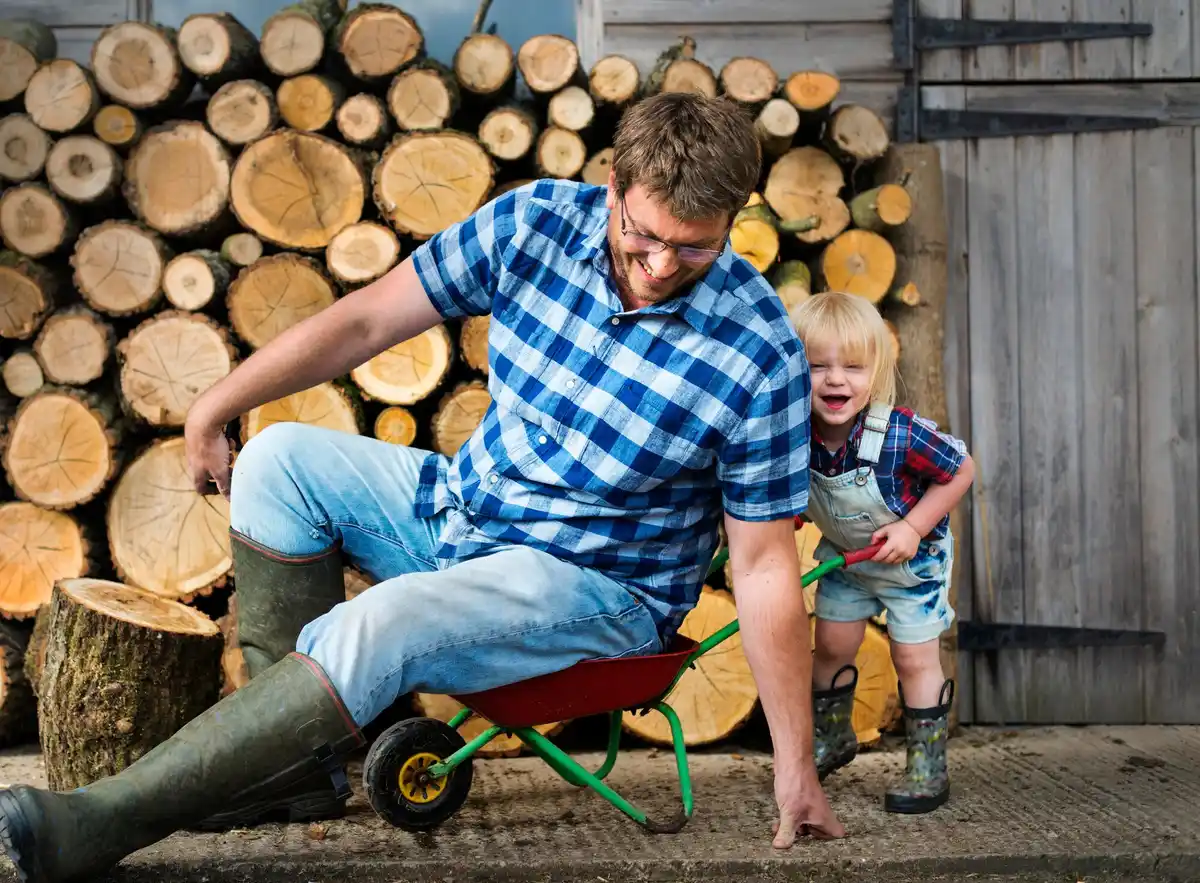 Dutch family gardening together in backyard