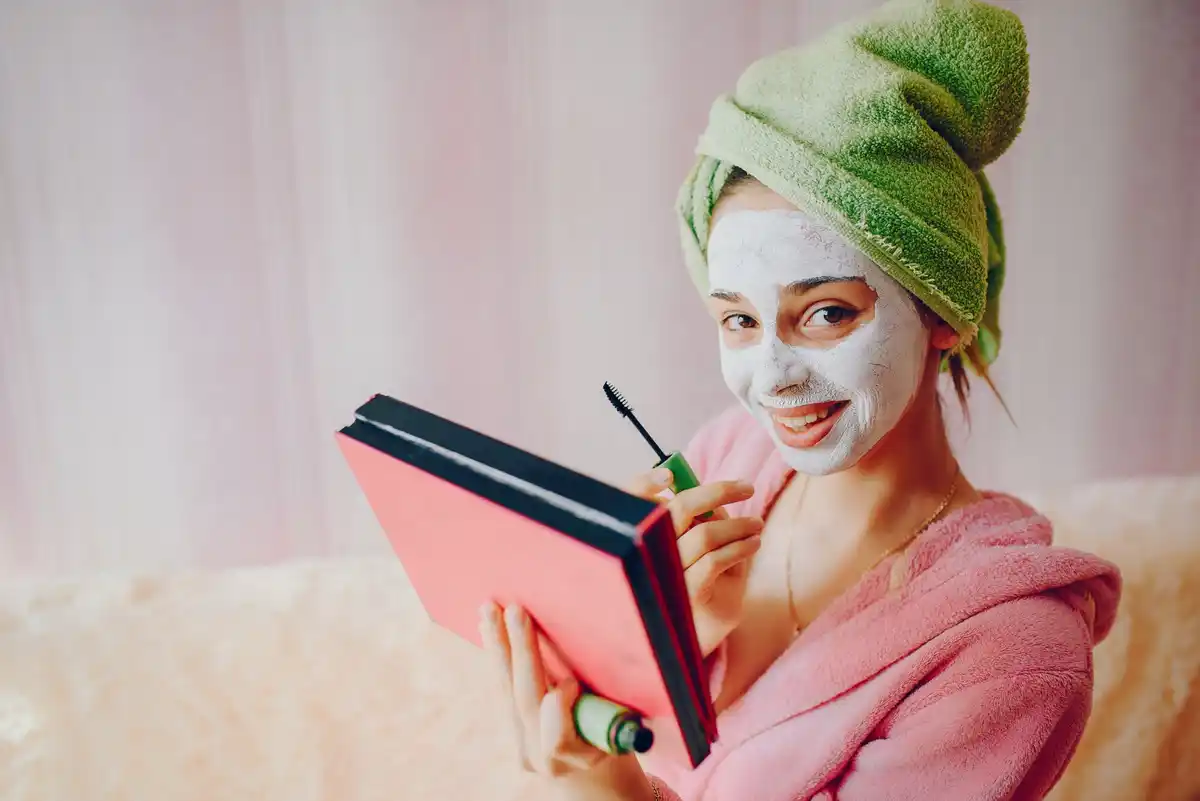 Dutch woman applying face mask home