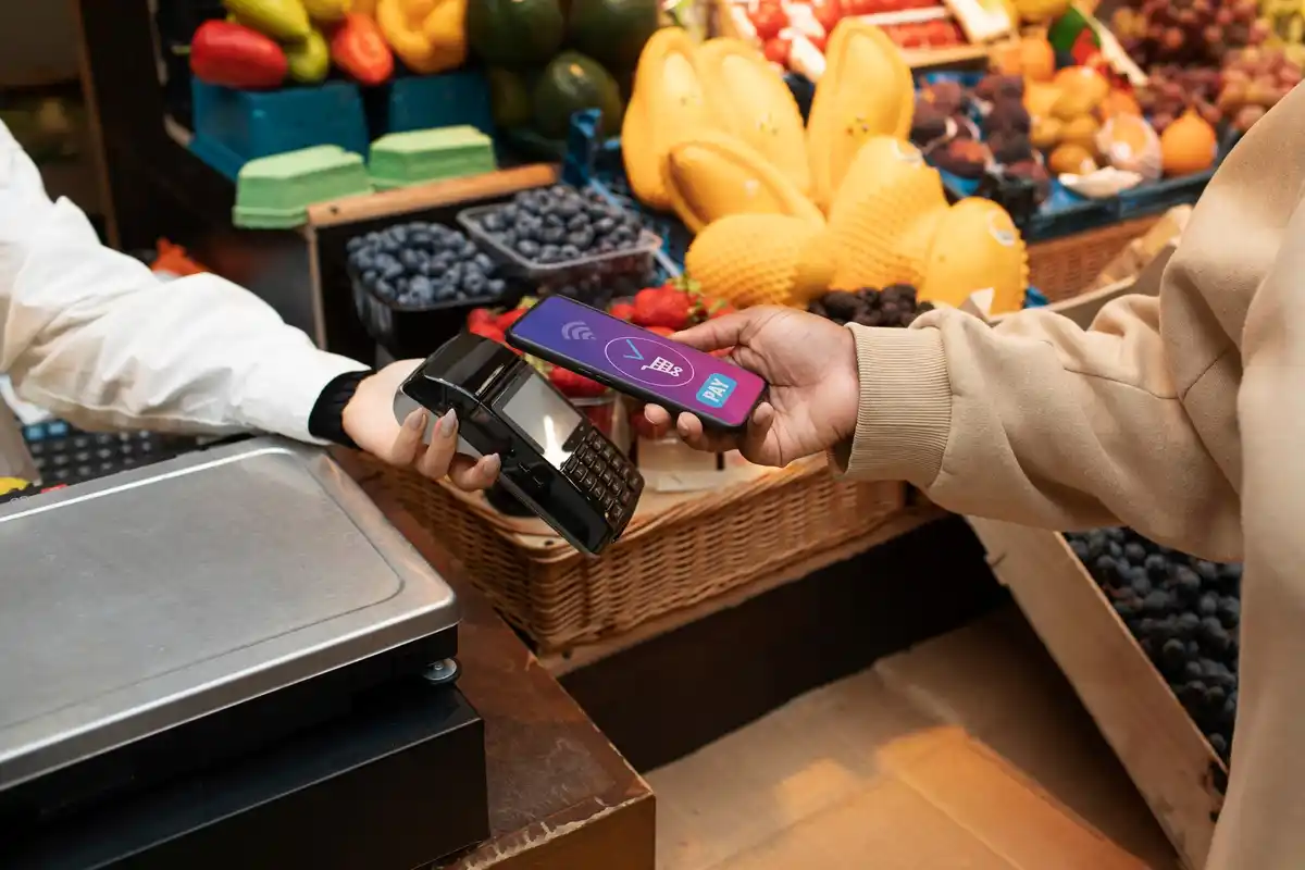 contactless payment dutch supermarket hand closeup