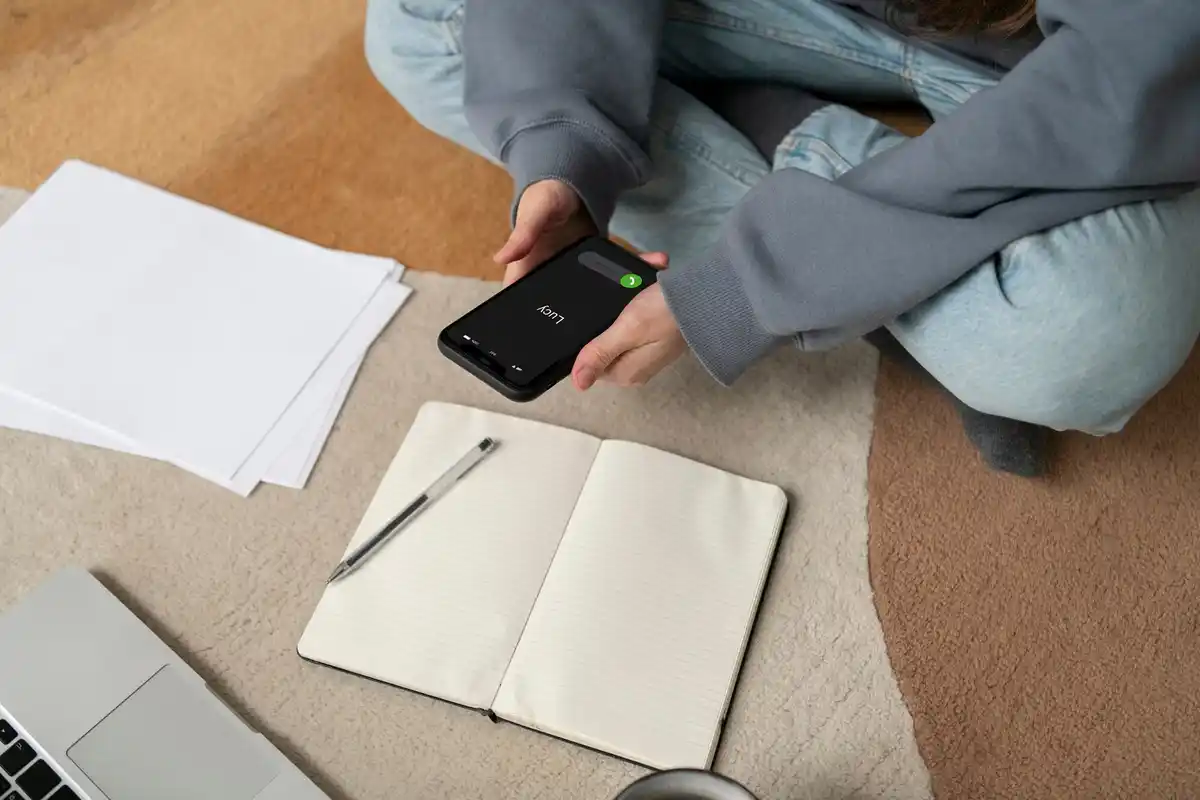 overheated smartphone with charging cable dutch office
