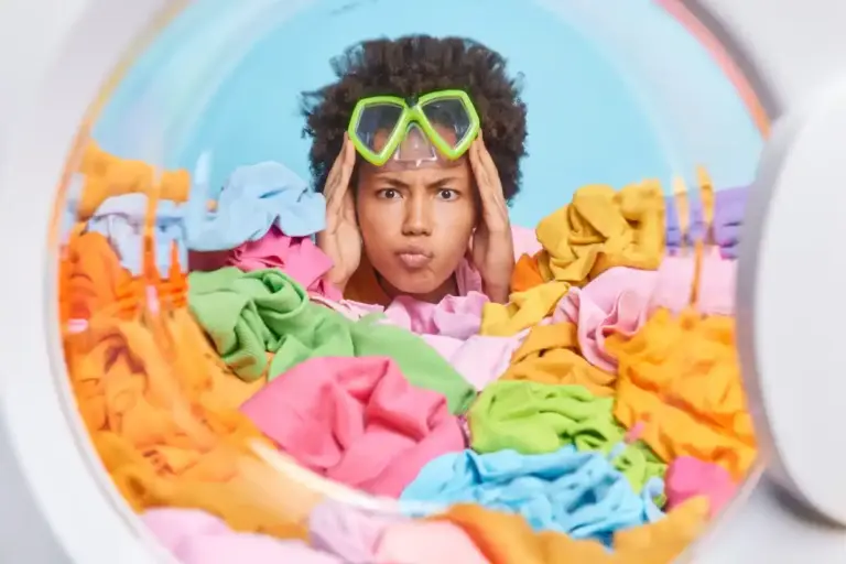chaotic colorful laundry pile