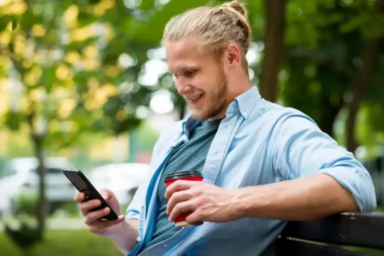 dutch person saving money with banking app smartphone euro