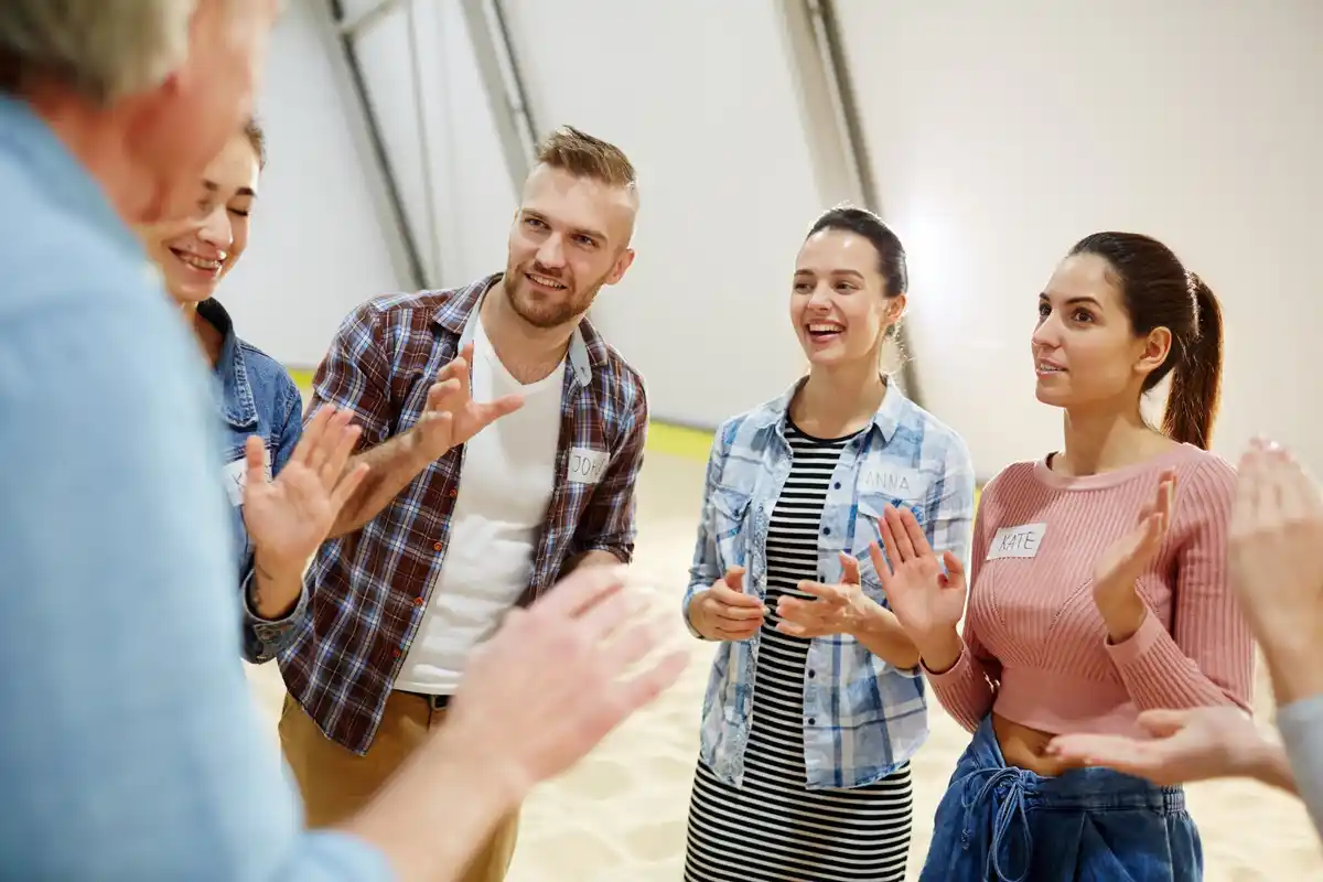 Dutch people greeting at office meeting, casual modern Netherlands