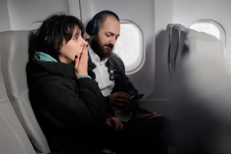man worrying at airport flight board netherlands