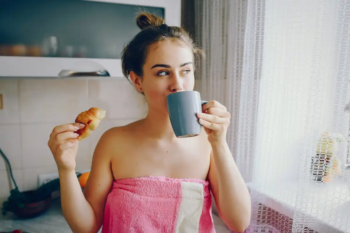 Dutch woman washing hair bathroom morning