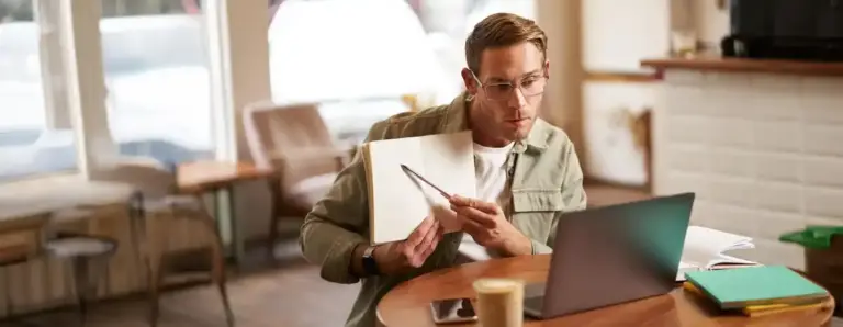 focused young adult at workspace