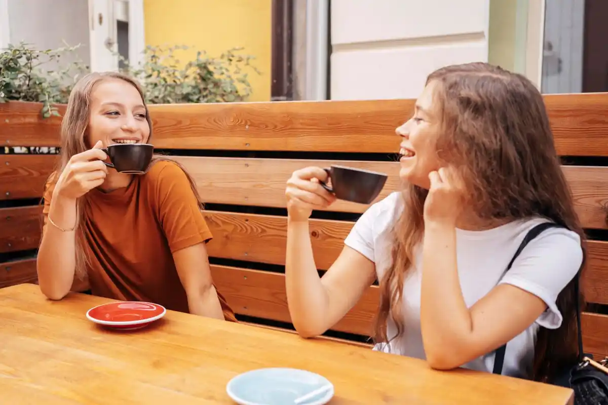 Dutch friends talking cafe cozy conversation