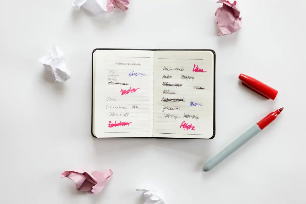 handwritten planner with doodles and reminders
