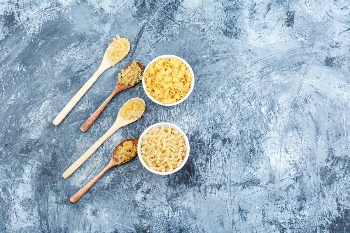 grated frozen lemon zest on pasta plate