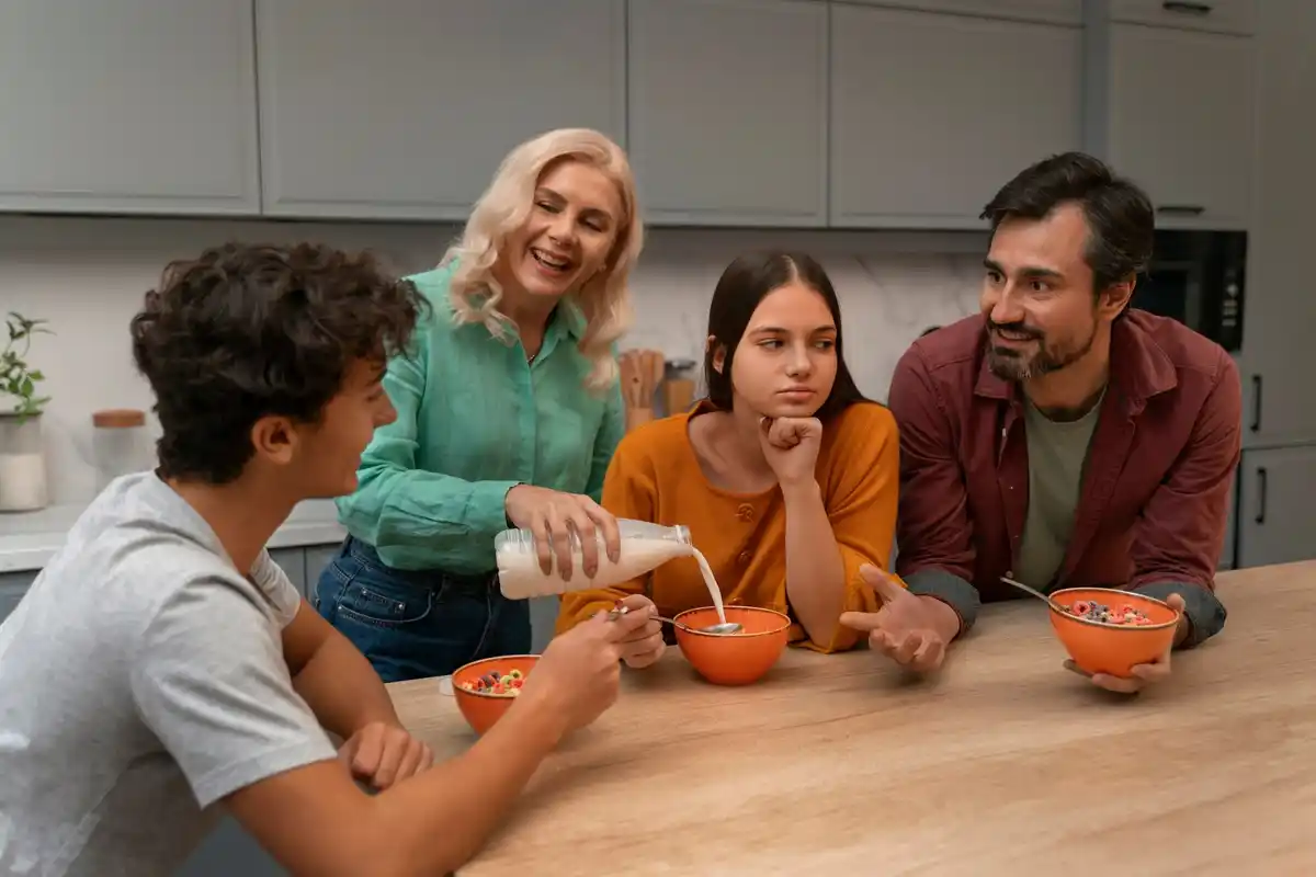 Dutch family eating leftover fried rice at home table