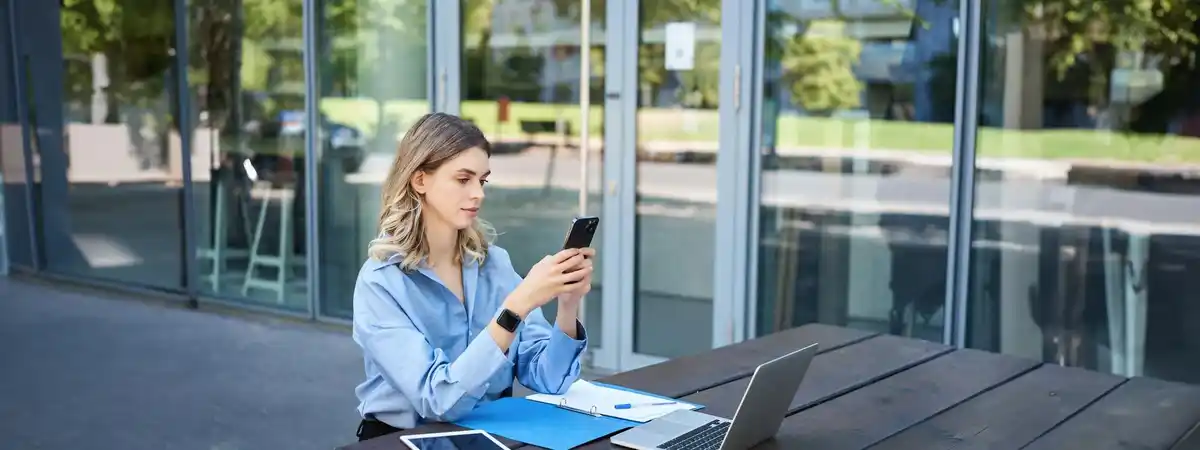 dutch person on phone looking distracted office