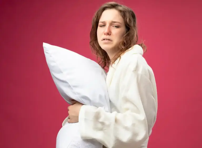 young woman stomach sleeping pillow face wrinkle morning dutch