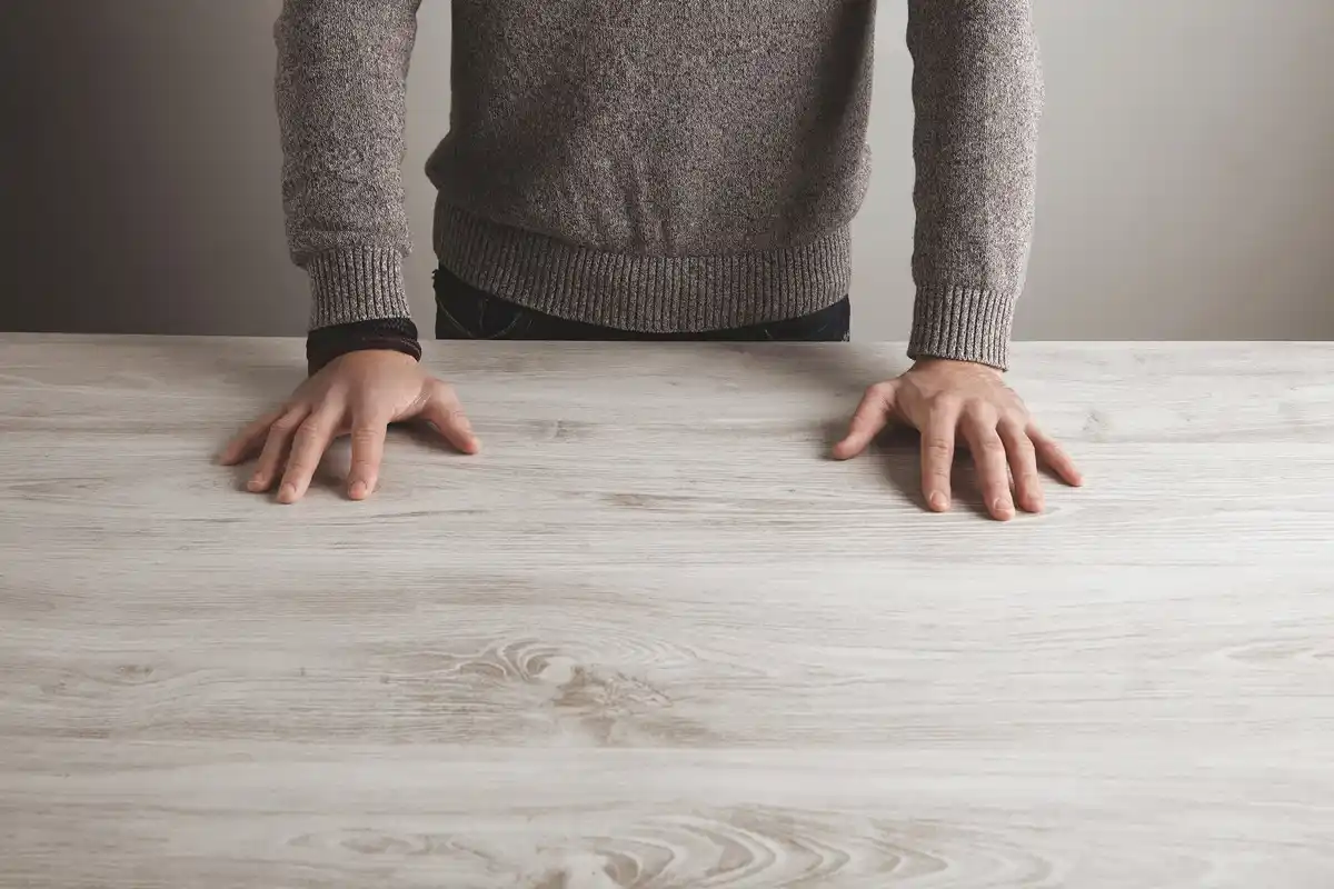 close up awkward hand gesture table netherlands
