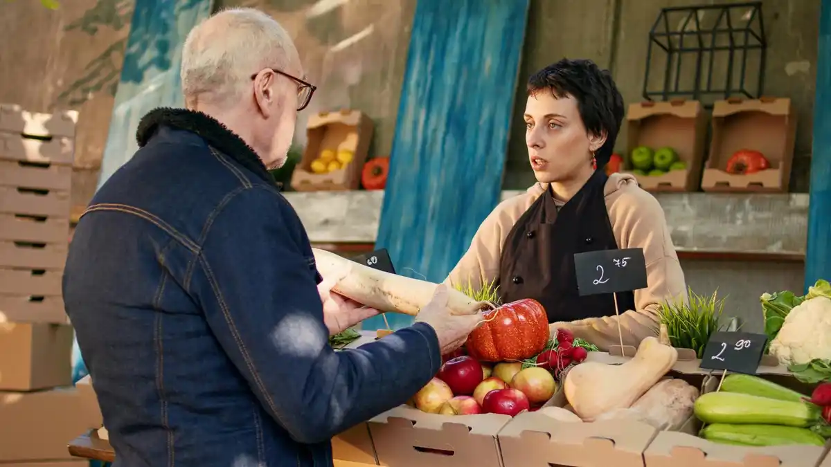 local supermarket cashier exchanging money with traveler